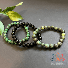 Carregar imagem no visualizador da galeria, 3 Pulseiras de Pedras Naturais Turquesa Africana, Onix e Jade Verde. Proporciona o Aumento da criatividade e Eleva a Intuição