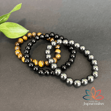 Carregar imagem no visualizador da galeria, 3 Pulseiras de Pedras Naturais Olho de Tigre, Onix e Hematita. Proporciona proteção, Aumenta Energia, Eleva a Segurança e Disciplina
