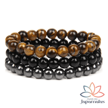 Carregar imagem no visualizador da galeria, 3 Pulseiras de Pedras Naturais Olho de Tigre, Onix e Hematita. Proporciona proteção, Aumenta Energia, Eleva a Segurança e Disciplina