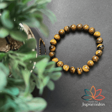 Carregar imagem no visualizador da galeria, Pulseira da Pedra Natural Olho de Tigre. Proporciona o Equilíbrio dos Chakras Inferiores e Ancora Energias Negativas