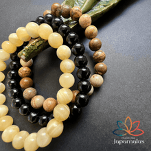 Carregar imagem no visualizador da galeria, 3 Pulseiras de Pedras Naturais Jaspe Madeira, Onix e Calcita. Elimina os Pensamentos Negativos e Acalma as Emoções
