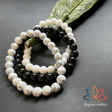 Carregar imagem no visualizador da galeria, 3 Pulseiras de Pedras Naturais Howlita, Onix e Ágata Branca. Eleva a Consciência, Estimula a Felicidade e o Otimismo
