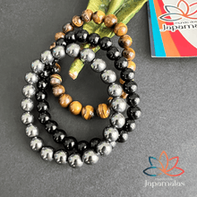 Carregar imagem no visualizador da galeria, 3 Pulseiras de Pedras Naturais Olho de Tigre, Onix e Hematita. Proporciona  proteção, Aumenta Energia, Eleva a  Segurança e Disciplina
