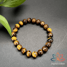 Carregar imagem no visualizador da galeria, Pulseira da Pedra Natural Olho de Tigre. Proporciona o Equilíbrio dos Chakras Inferiores e Ancora Energias Negativas
